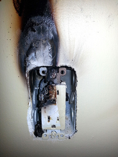 Aluminum Wiring Caused Fire in a Wall Receptacle Image